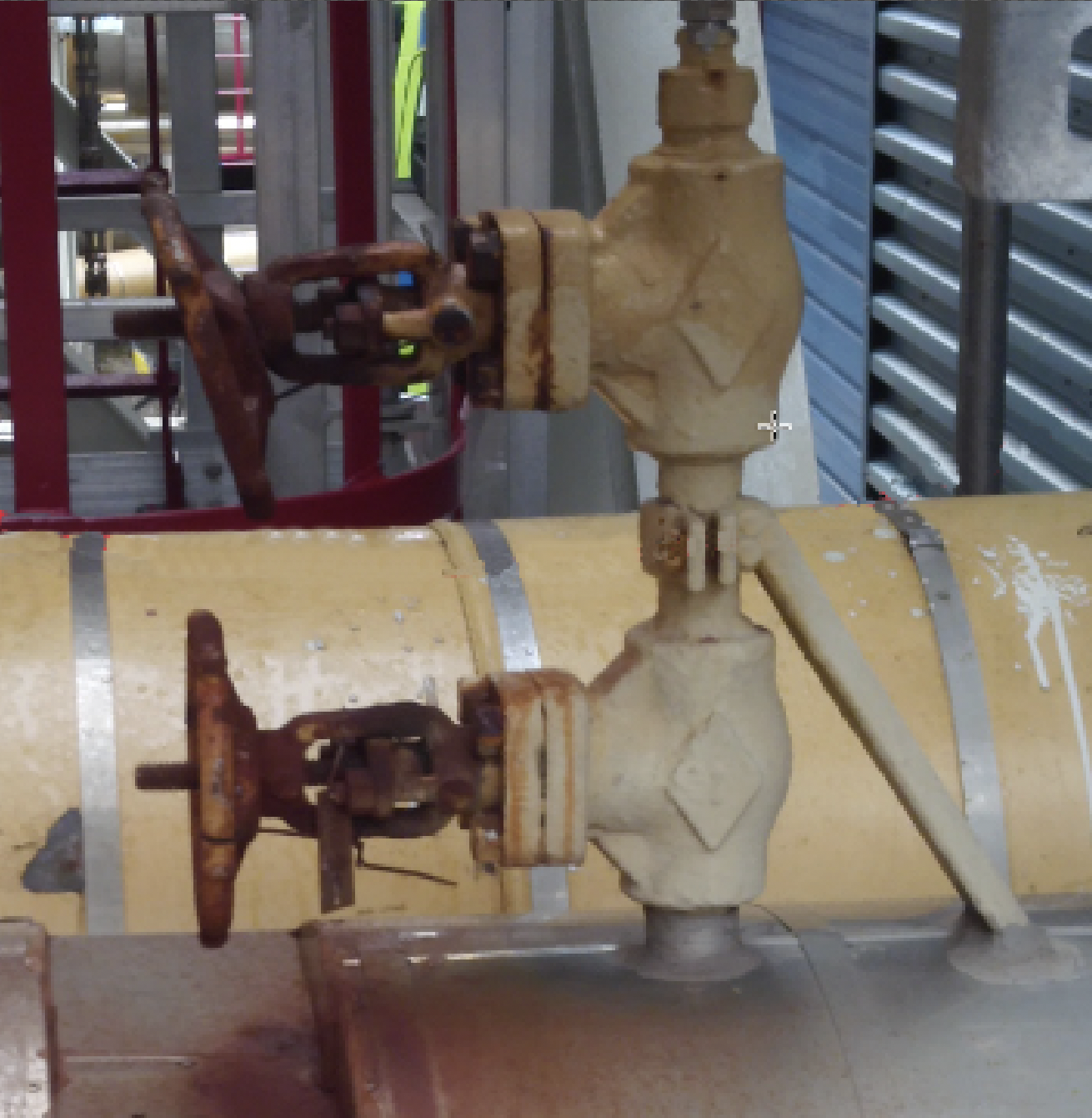 Broken hand wheel enveloped in rust